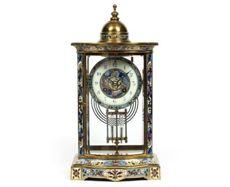 A LATE 19TH CENTURY FRENCH BOW FRONT FOUR GLASS MANTEL CLOCK, with champleve enamel Gothic numeral dial, twin train coiled go