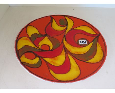 A Poole charger - Diameter 35cm 
Condition report: No obvious damage 