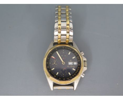 A bi metal cased ETA gents wristwatch, the black dial with baton markers centre sweep seconds, day and date aperture at 3 o'c
