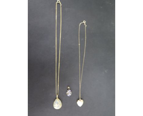 A 9ct yellow gold pendant, a gold plated locket on chain and a jade pendant in dragon surround - not tested but possibly 14ct