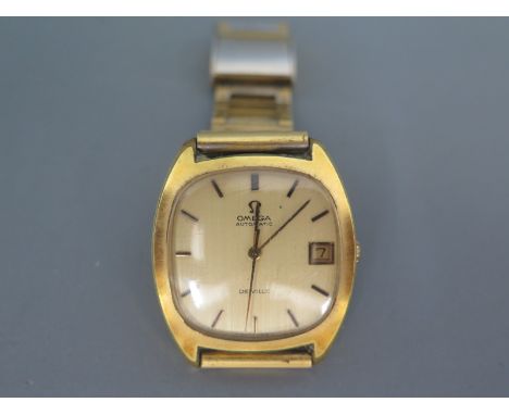 A gold plated cased gentleman's Omega de Ville wristwatch, gold coloured dial with baton markers, date aperture at 3 o'clock,