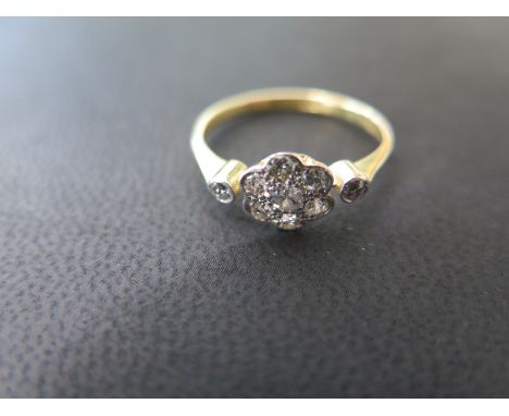 An 18ct yellow gold diamond cluster ring - size N - Weight approx. 2.4 gs 
Condition report: Condition good stones bright 