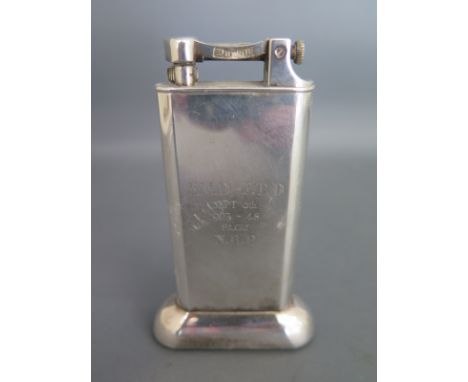 A Dunhill plated table lighter reg 737418 presentation engraving generally good