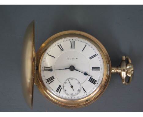 A gold plated full hunter pocket watch by Elgin, white enamel dial with Roman numerals to chapter ring, subsidiary second dia