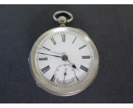 A silver cased open faced pocket watch, white enamel dial with Roman numerals to chapter ring, subsidiary second hand dial at