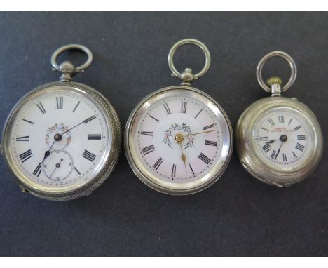 Three silver cased Ladies pocket watches, the largest marked .800 - one Swiss marked .800 - the smallest marked .900 Swiss - 