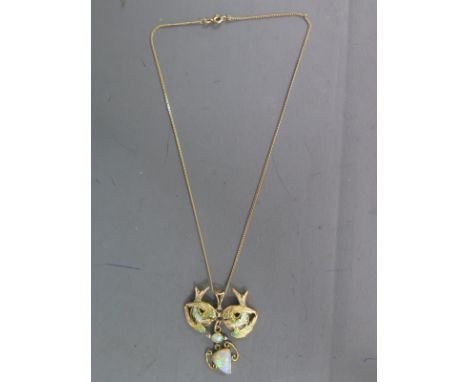 A gold and enamel pendant of two swallows with a added opal drop suspended on a 9ct gold chain - repair to brooch, enamel app