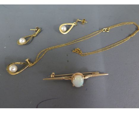 A 10ct opal brooch and a 9ct pearl necklace and earring set all good condition - total weight approx 6 grams