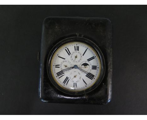 A large base metal Captains chronometer pocket watch top wind with day, date, month and moon phase and second subsidiary dial