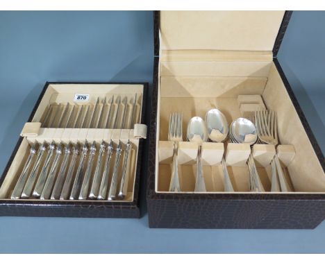 A canteen of silver hallmarked flatware by Mappin and Webb including two spoons, five dessert spoons, six soup spoons, six de
