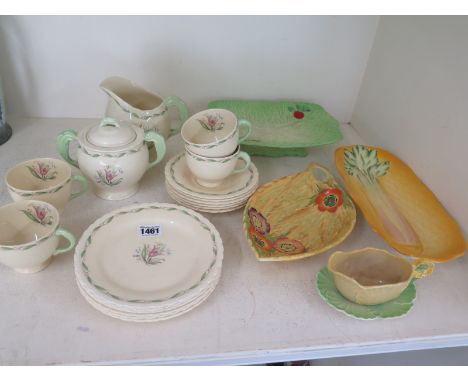 A 1930's nineteen piece teaset by Newhall pottery, four pieces of Carlton ware and a Beswick celery dish - 24 pieces
Conditio