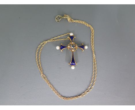 A 14ct yellow gold, blue enamel and pearl Crucifix on a 14ct gold chain with a square cut sapphire to centre - Weight approx.