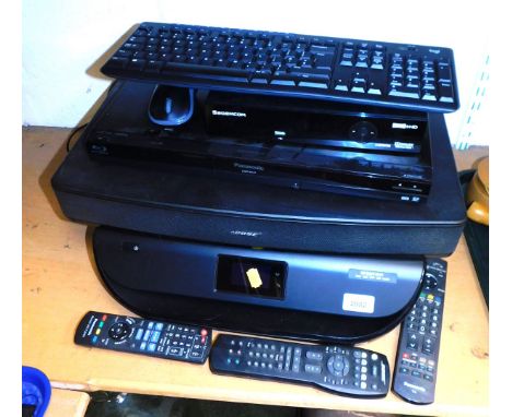 A HP MV4527 printer/scanner/copier, a Panasonic blu-ray disc player, model number DMPBD45, a Sagemcomm freeview plus HD box, 
