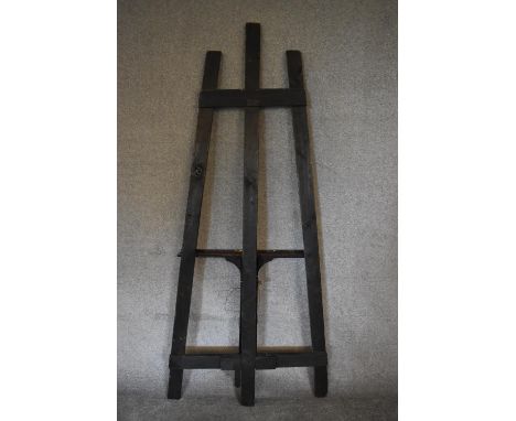 A large black painted wooden easel. H.193 x 73cm (Property of the late Jacqueline Morreau 1929-2016) 