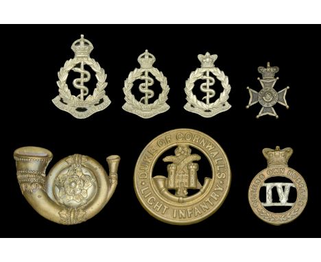 A Selection of Military Badges c.1900. Comprising Pagri badges of the 4th Hussars, Duke of Cornwall’s Light Infantry, and Kin