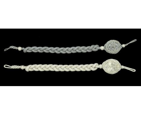 German Second World War Armed Forces Lanyards. Two lanyards, the first the Marksmanship lanyard for the Luftwaffe, the laurel
