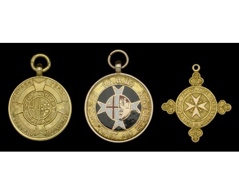 A group of three Great Western Railway Gold First Aid Medals awarded to Mr. J. H. Tippett  Great Western Railway Medal for Fi