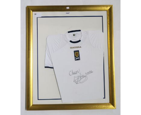 SPORTING MEMORABILIA A framed Scotland away shirt, signed by Alex McLeish Condition Report:Available upon request