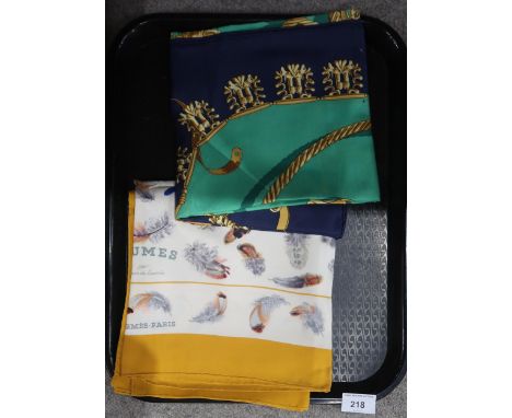 A Hermes Plumes par Henri de Linares scarf, depciting colourful feathers on a white ground with yellow border, together with 
