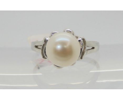 An 18k white gold pearl set ring, size M, weight 2.8gms, pearl approx 8.3mm Condition Report:Available upon request