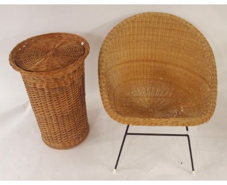 A mid 20th century wicker "satellite" style chair and a wicker laundry hamper (2) Condition Report:Available upon request