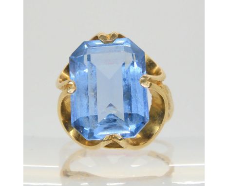 A 9ct retro ring set with a large blue gem, size l, weight 6.6gms Condition Report:Available upon request