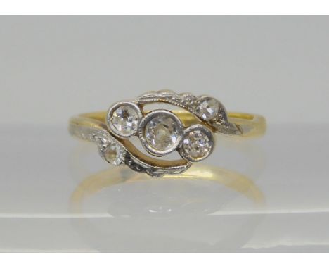 An 18ct gold vintage five stone diamond ring, set with estimated approx 0.20cts of old cut diamonds, finger size G, weight 2.