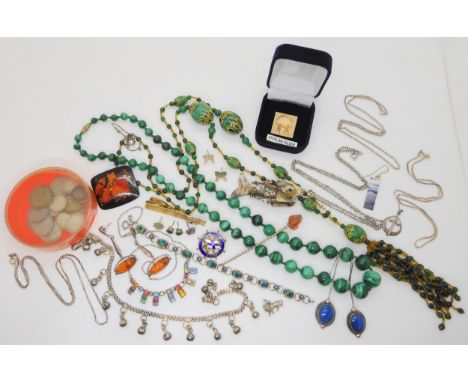 A collection of costume jewellery and silver to include a continental silver and enamel bracelet, a mother of pearl fish pend