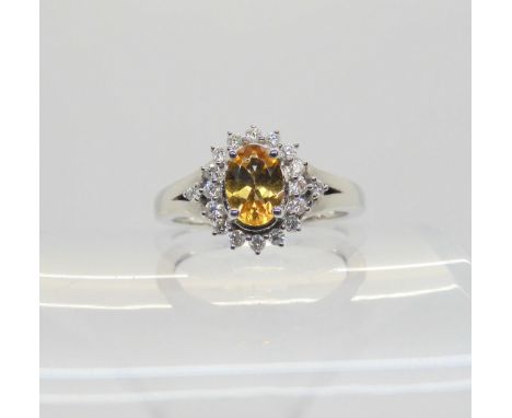 A 9ct white gold imperial topaz and diamond ring, size R, with a Jewellery Channel Guarantee card, weight 3.3gms Condition Re