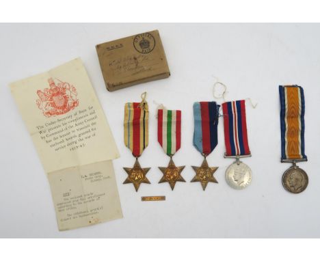 A WW2 medal group comprising War Medal, 1939-45 Star, Italy Star and Africa Star with 1st Army clasp, with its original cardb