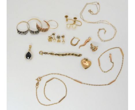 A collection of 9ct gold and yellow metal items to include ring shanks, pendants and chains, weight together 15.3gms Conditio