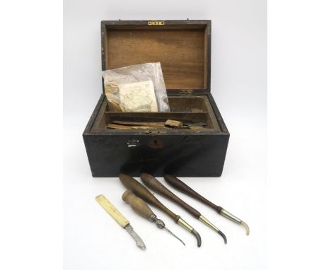 A case of specialist gilders' tools, to include a packet of gold powder and a book of gold leaf Condition Report:Available up