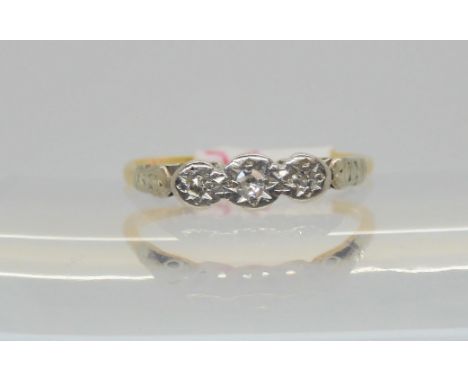 An 18ct and platinum three illusion set diamond ring, size L1/2, weight 1.6gms Condition Report:Available upon request