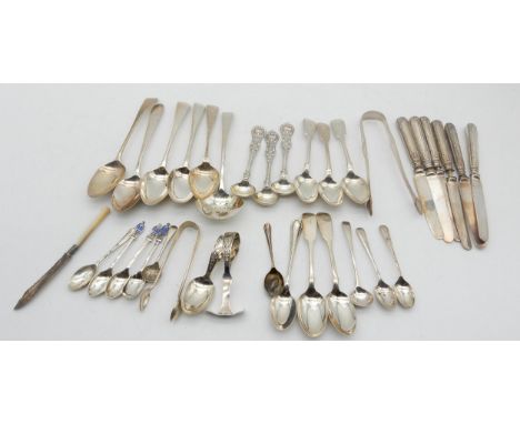 A collection of silver flatware including an 18th century Irish sifter ladle, Dublin, marks rubbed, another Irish silver spoo