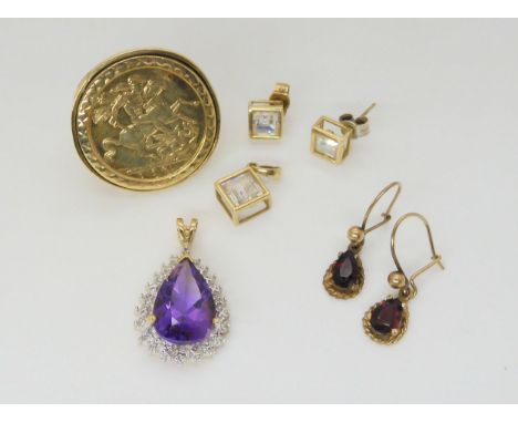 A 9ct gold faux sovereign ring, size S, an amethyst and diamond accent pendant two pairs of gem set earrings and a pendant, w