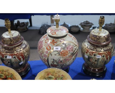 A pair of Chinese style lamps and another lamp Condition Report:Available upon request