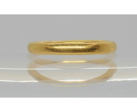 A 22ct gold wedding ring, size O1/2, weight 4.1gms Condition Report:Available upon request