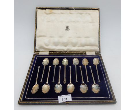 A cased set of silver coffee spoons, by&nbsp;William Briggs &amp; Co , Sheffield 1918, and a silver Apostle spoon, by Martin 