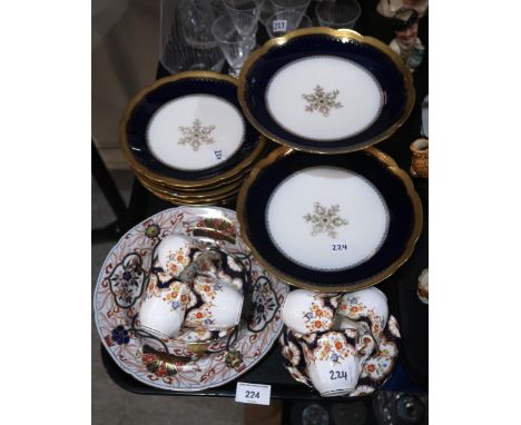 A Limoges dessert service, the white ground with royal blue and gilt decoration, a Spode plate and a English coffee set Condi