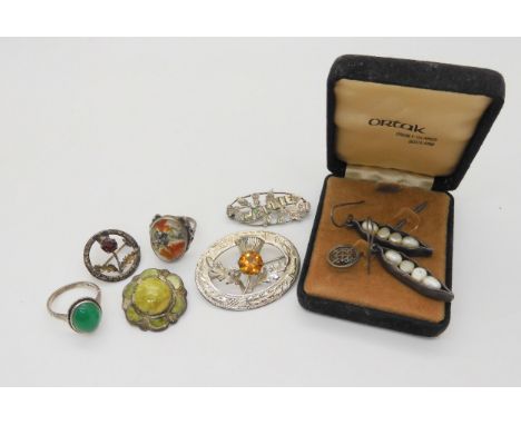 A silver Celtic knotwork moss agate ring, two brooches by Ward Brothers, a silver&nbsp;Iona marble set Scottish brooch and ot