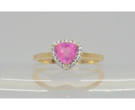 A 9ct gold trilliant cut pink sapphire and white zircon ring, size Q, weight 2.6gms Condition Report:Available upon request