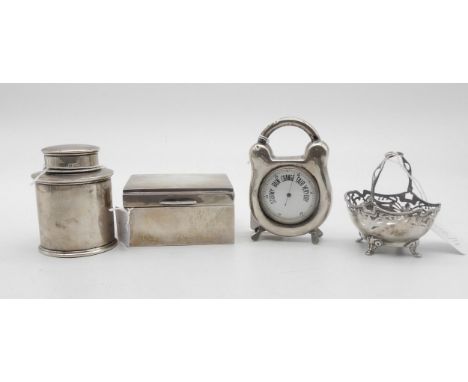 An Edwardian novelty silver barometer, the case padlock shaped, on four flattened feet, Birmingham 1909, a silver tea caddy, 