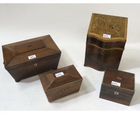 A Victorian mahogany sarcophagus-form tea caddy, a smaller rosewood tea caddy, a mahogany stationary box and a further rosewo
