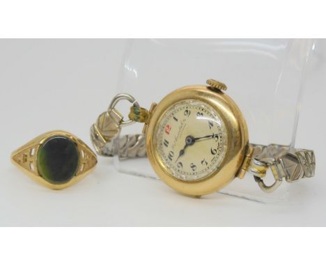 A 9ct gold bloodstone signet ring, size T, with a 9ct gold vintage watch, weight to include gold plated watch strap, and mech