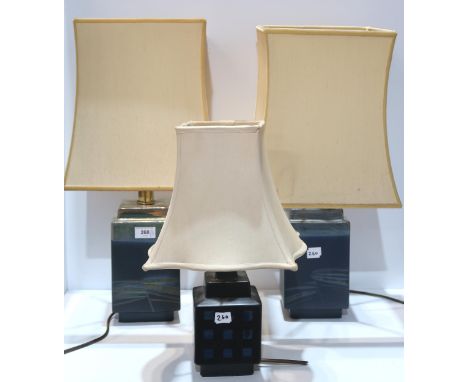 A pair of Margery Clinton table lamps and another lamp by the same hand Condition Report:Available upon request