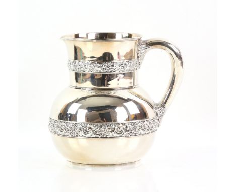 Tiffany &amp; Co., 19th century silver water pitcher, design no. 3077 Makers 6256, maker's mark T, New York, the baluster for