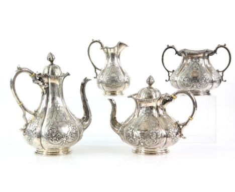 Victorian silver four-piece tea service, the lobed bodies embossed with floral panels and with beaded rims, by Thomas Bradbur