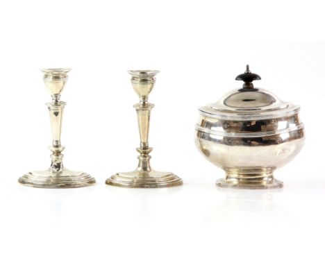 Pair of Edward VII silver candlesticks on eliptical bases, by C M &amp; S Ld., Birmingham, 1908, (filled bases), and a sucrie