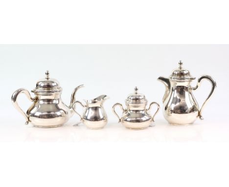 Continental silver four piece tea and coffee service, comprising coffee pot, tea pot, cream jug and sucrier and cover, marked