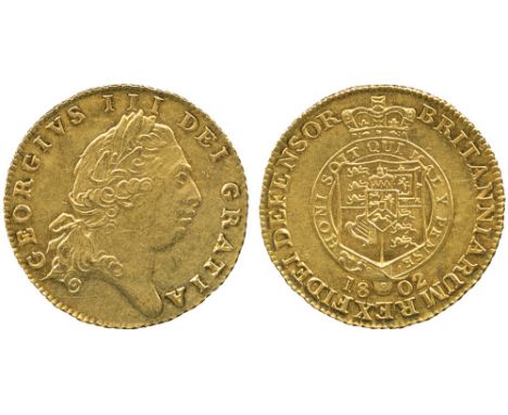 G BRITISH COINS, George III, Gold Half-Guinea, 1802, sixth laureate head right, rev quartered shield of arms with an escutche